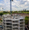 Aerial view of a new modern house under construction with a work Royalty Free Stock Photo