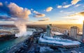 Niagara Falls City downtown horizon and Horseshoe Falls in a winter sunny day sunset time. Royalty Free Stock Photo