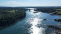 Aerial view of the Niagara Falls Rainbow Bridge with a blue sky in the background, United States Royalty Free Stock Photo