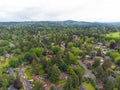 Aerial view. Nice little town. There is a lot of greenery, mountains, well-kept houses, asphalt roads. A cozy heavenly place. Royalty Free Stock Photo