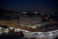 Aerial view at night cityscape with luminous buildings