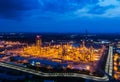 Aerial view night light oil terminal is industrial facility for storage of oil and petrochemical. oil manufacturing products ready Royalty Free Stock Photo