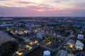Aerial view night light oil terminal is industrial facility for storage of oil and petrochemical. oil manufacturing products ready Royalty Free Stock Photo
