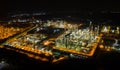 Aerial view night light oil terminal is industrial facility for storage of oil and petrochemical. oil manufacturing products ready Royalty Free Stock Photo