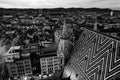 Aerial view of the night Vienna, Austria with illuminated buildings and Stephansdom cathedral. Black and white