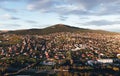 Aerial view of Nitra city in Slovakia on sunset with Zobor Hill on background. Nitra city from above - photo taken by drone in Royalty Free Stock Photo