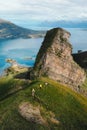 Aerial view in Norway family hiking in rocky mountains outdoor group hikers active vacations