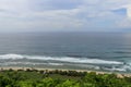 Aerial view of Nyang Nyang beach on Bali in Indonesia. A popular spot of surfers with big waves in the Indian Ocean. Fishing boats Royalty Free Stock Photo