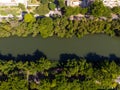 Aerial view o Marapendi canal in Barra da tijuca on a summer day. Green vegetation can be seen on both sides, as well as Royalty Free Stock Photo