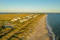 Aerial view of Oak Island North Carolina coast line. Sand dunes and houses in view. Royalty Free Stock Photo