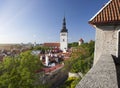 Aerial view on observation deck of Old city roofs and St. Nicholas Church Niguliste . Tallinn. Estonia Royalty Free Stock Photo