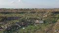 Aerial view of a occasional garbage dump polluting the surrounding nature