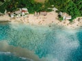 Aerial view of ocean and coastline with cozy hotels on Impossibles beach in Bali island