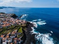 Aerial view of the ocean surf on the reefs coast of San Miguel island, Azores.