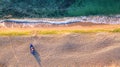 Aerial view of ocean waves and sand on beach Royalty Free Stock Photo