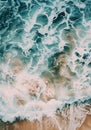 Aerial View of Ocean Waves and Sand