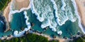 Aerial view of ocean waves at sunset. Beautiful nature background. Aerial view of sea waves crashing on the beach. Top view. Royalty Free Stock Photo