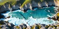 Aerial view of ocean waves at sunset. Beautiful nature background. Aerial view of sea waves crashing on the beach. Top view. Royalty Free Stock Photo