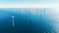 Aerial view of offshore wind turbines farm on the ocean. Sustainable energy. Royalty Free Stock Photo