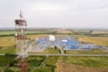 Aerial view of oil and fuel storage tank farm and telecommunication tower Royalty Free Stock Photo