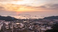 Aerial view of Oil and gas industry - refinery, and Petrochemical plant on island at evening sunset background Royalty Free Stock Photo