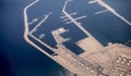 Aerial view of oil refinery and tankers loading along the coast of Qatar