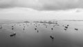 Aerial view Oil ship tanker parking in sea and cloud storm background at evening, waiting for load and unload oil from refinery Royalty Free Stock Photo