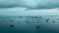 Aerial view Oil ship tanker parking in sea and cloud storm background, waiting for load and unload oil from refinery for Royalty Free Stock Photo