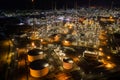 Aerial view oil storage tank with oil refinery factory industrial. Oil refinery plant at night. industry factory concept and Royalty Free Stock Photo