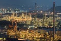 Aerial view oil storage tank with oil refinery background, Oil refinery plant at night