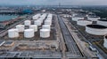 Aerial view oil storage tanks at petrol industrial zone, Refinery factory crude oil storage tank and pipeline steel Royalty Free Stock Photo