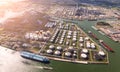 Aerial view of oil tankers and storage silo tanks at a petrochemical terminal port Royalty Free Stock Photo