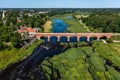 Aerial view of an old bridge across the Venta river in Kuldiga, Latvia Royalty Free Stock Photo