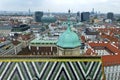 Aerial view of old city rooftops and high rise modern buildings in Vienna