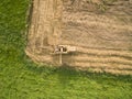 Aerial view of a old combine harvester at the grain harvest Royalty Free Stock Photo