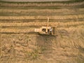 Aerial view of a old combine harvester at the grain harvest Royalty Free Stock Photo