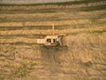 Aerial view of a old combine harvester at the grain harvest Royalty Free Stock Photo