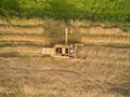 Aerial view of a old combine harvester at the grain harvest Royalty Free Stock Photo