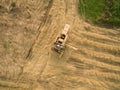 Aerial view of a old combine harvester at the grain harvest Royalty Free Stock Photo