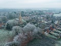 Aerial view of an old English church seen during a wintery December Royalty Free Stock Photo