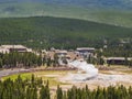 Aerial view of the Old Faithful geyser hot water eruptions