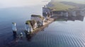 An aerial view of the Old Harry Rocks along the Jurassic coast with crystal clear water and white cliffs under a hazy sky Royalty Free Stock Photo