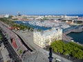 Aerial view the old port of Barcelona on a clear sunny day. Large cruise ships are moored to the pier. Royalty Free Stock Photo