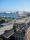 Aerial view the old port of Barcelona on a clear sunny day. Large cruise ships are moored to the pier. Royalty Free Stock Photo