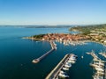 Aerial view of old town Izola in Slovenia, cityscape with marina at sunset. Adriatic sea coast, peninsula of Istria, Europe Royalty Free Stock Photo