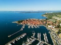 Aerial view of old town Izola in Slovenia, seascape with marina at sunset. Adriatic sea coast, peninsula of Istria, Europe Royalty Free Stock Photo