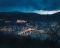 Aerial view of Old Town at night with Heidelberg Castle and Old Bridge (Alte Brucke) - Heidelberg, Germany Royalty Free Stock Photo