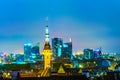 Aerial view of the old town of Tallin dominated by spire of the town hall with modern business district on background Royalty Free Stock Photo