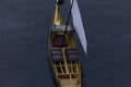 Aerial view of one yellow Rabelo boat. Traditional boat that carries Port Wine in Douro river. Porto, Portugal. Royalty Free Stock Photo