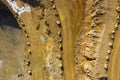 Aerial view of opencast mining quarry with lots of machinery. Industrial place view from above. Photo captured with drone Royalty Free Stock Photo